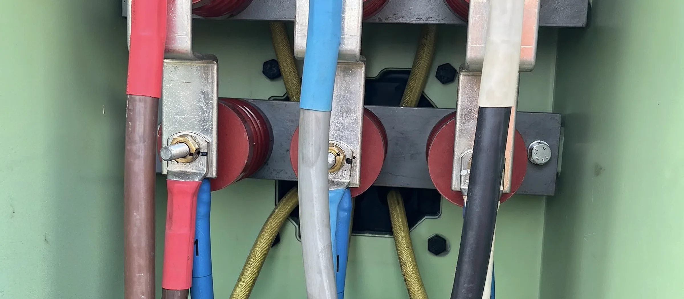 High voltage cable terminations landed on busbar inside a switchgear cubicle