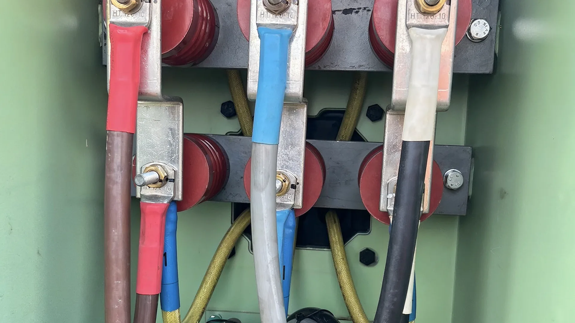 High voltage cable terminations landed on busbar inside a switchgear cubicle